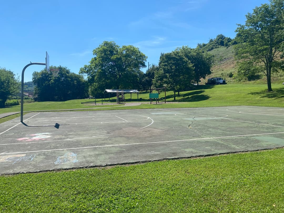 Basketball area in the neighborhood park Sunshine street.