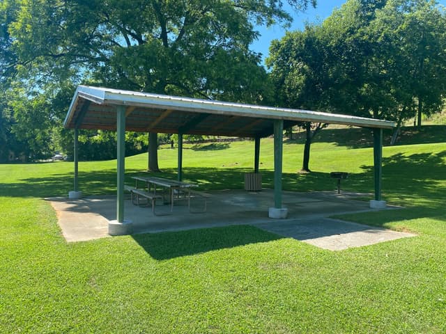 Picnic area at the neighborhood park, on Sunshine street.