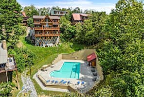 The community pool is conveniently located right in the backyard, offering a private feel with easy access. Perfect for a refreshing swim or lounging poolside, this amenity adds to the ultimate vacation experience. Relax, unwind, and enjoy the sun!