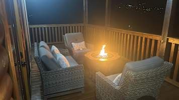 Unwind by the cozy outdoor fire pit, perfect for relaxing under the stars. Enjoy the fresh mountain air and comfortable seating in a peaceful setting. A perfect retreat in Gatlinburg, just minutes from top attractions!