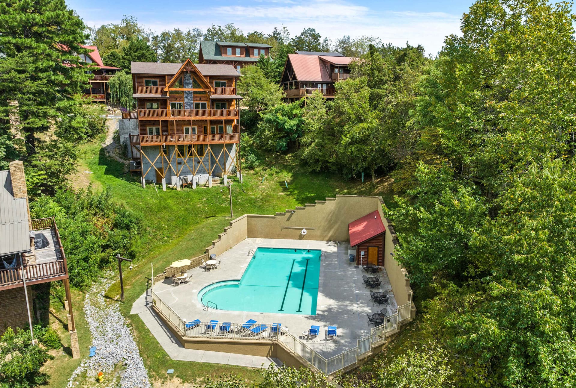 The community pool is conveniently located right in the backyard, offering a private feel with easy access. Perfect for a refreshing swim or lounging poolside, this amenity adds to the ultimate vacation experience. Relax, unwind, and enjoy the sun!