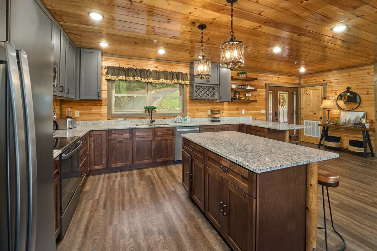 Enjoy a fully equipped kitchen stocked with all essentials for cooking and dining. Modern appliances, ample counter space, and cabin charm make this the heart of your getaway.